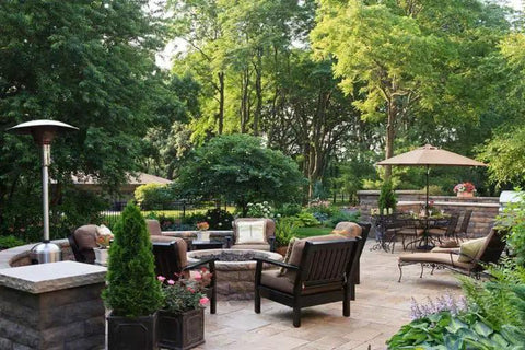 Real Deal Wet Look High Gloss Concrete And Paver Sealer For Exterior Patios featuring five gallon container in a beautiful patio setting.