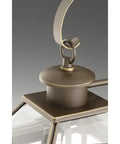 Close-up of the Burlington Two Light Wall Lantern in oil rubbed bronze finish detail with beveled glass design.