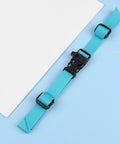 Adjustable chest strap for backpacks with quick release buckle, durable nylon fastener, outdoor strap, blue version, on display