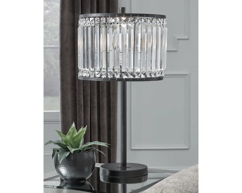 27 Inch Modern Glam Crystal Table Lamp In Black with crystal beaded drum shade on glass table near window in living room.