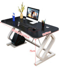 Prime Setup White Computer Desk With Built In Phone Slot And Utility Shelf Ergonomic Gaming Table for Laptop PC with sleek black surface.