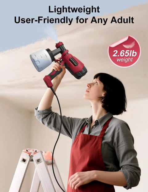 Person using Electric Paint Sprayer With 3 Spray Patterns And 4 Brass Nozzles for ceiling, showcasing lightweight design.