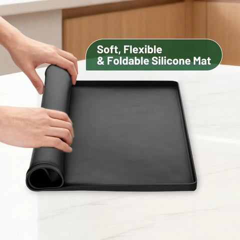 Heavy Duty Silicone Oil Drip Mat For Under Car 27x27 Inch Non Slip Oil Spill Tray being rolled up on table