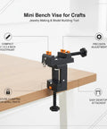 Compact Mini Bench Vise Perfect For Jewelry Making And Model Building, Durable PP Plastic Desktop Clamp Holds Parts Steady For Engraving Sanding Crafts And DIY Projects Black on desk with precision adjustment.