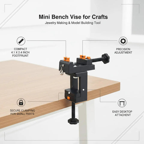 Compact Mini Bench Vise Perfect For Jewelry Making And Model Building, Durable PP Plastic Desktop Clamp Holds Parts Steady For Engraving Sanding Crafts And DIY Projects Black on desk with precision adjustment.