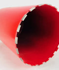 Red 11-inch diamond wet core drill bit with segmented outer edge