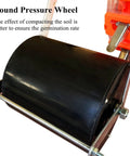 Manual Seed Spreader and Fertilizer Applicator pressure wheel for garden rows, enhancing soil compaction for better germination rate.