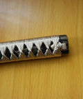 Close-up of Samurai Katana Tsuka Handle 10.2 Inch Do It Yourself DIY Grip Upgrade with woven wrap and alloy fittings on hardwood core.