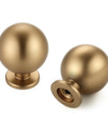 Super Durable Zinc Alloy Round Ball Cabinet Knobs One Inch Diameter Twelve Pack Champagne Bronze, close up of two knobs.
