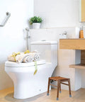 Non Slip Shower Chair Feet Replacement Kit 8 Pack Durable Rubber Foot Caps on a wooden bathroom stool near toilet