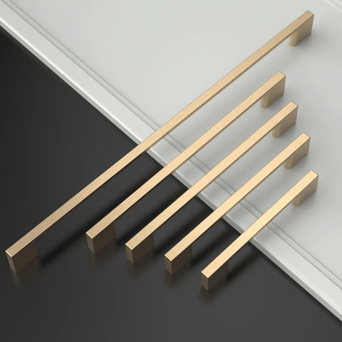 10 Pack Brushed Brass Cabinet Pulls With 7 Point Five Inch Hole Centers Zinc Alloy Gold Tone Hardware on a dark surface.