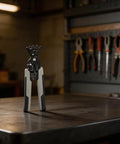 Heavy Duty Wire Stripping Tool With Non Slip Rubber Handle And Heat Treated Steel Jaws on workshop table