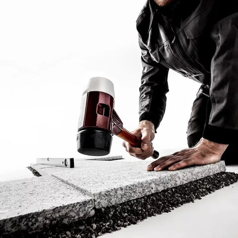 Pro Grade Heavy Duty Soft Faced Mallet With Dual Inserts Rubber Black Medium Hard And White Superplastic used on stone