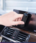 Using 2 Pack Car And Device Screen Cleaner Spray And Wipe 2 In 1 Touchscreen Mist Cleaner For iPhone iPad Laptop MacBook And More With Microfiber Cloth Streak Free Fingerprint Remover Grey And Rose Gold on car screen.