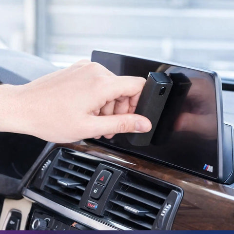 Using 2 Pack Car And Device Screen Cleaner Spray And Wipe 2 In 1 Touchscreen Mist Cleaner For iPhone iPad Laptop MacBook And More With Microfiber Cloth Streak Free Fingerprint Remover Grey And Rose Gold on car screen.