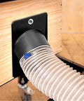Pro Grade 4 Inch Angled Dust Port For Table Saws And Jointers connected to a dust hose, showing black ABS plastic design.