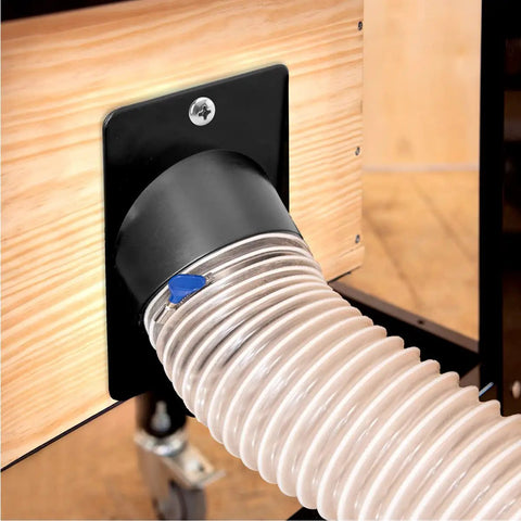 Pro Grade 4 Inch Angled Dust Port For Table Saws And Jointers connected to a dust hose, showing black ABS plastic design.