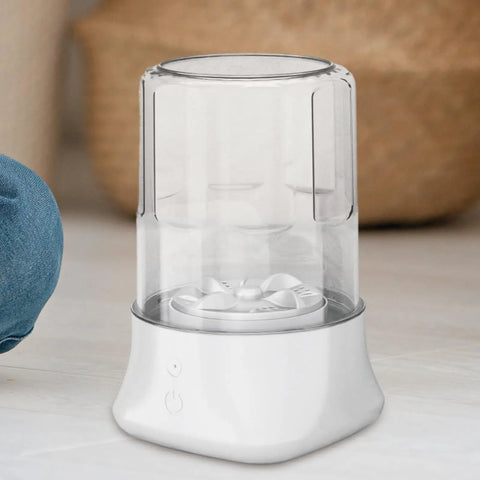 Portable Underwear Washer Mini Compact Laundry Device Built In Rechargeable Battery Perfect For Dorms Apartments And Travel Quick Spin Cycle Skips Hand Scrubbing Making Tiny Loads Clean As A Whistle No Plumbing Needed, clear design with internal spinning mechanism.