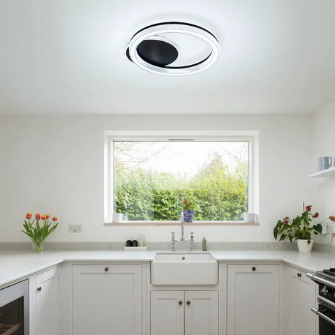 White Finish Modern Flush Mount Circle Ring LED Ceiling Light With Three Color Temperature Settings in a bright kitchen