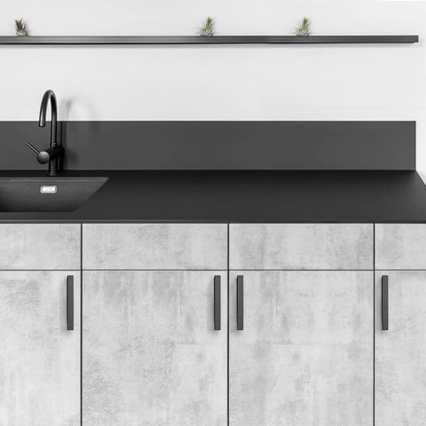 Black 5 Inch Square Cabinet Pulls 30 Pack on modern kitchen cabinets with stainless steel handles, sink, and black countertop.
