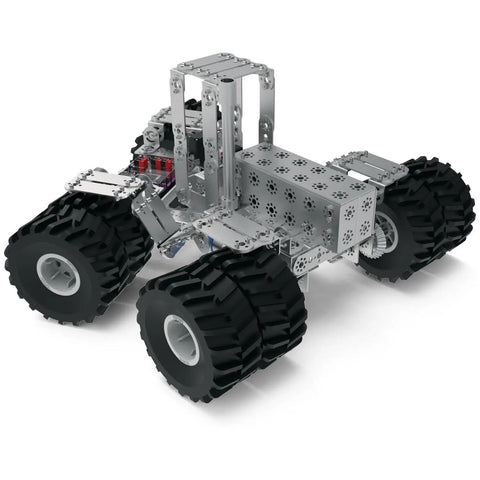 All Terrain Tire Kit For TETRIX MAX Robotics with monster truck style wheels and foam inserts on a robotic vehicle frame.