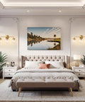 Bedroom with Three Light Vanity Wall Sconce Over Mirror In Matte Gold Finish, transparent glass ball shades above nightstands
