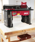 Benchtop Portable Router Table With Above Table Lift And Dual Sided Bit Storage Fits RT1323 00 And RT1322 00 Routers Not Included great for DIYers and woodworking pros, table on wooden workbench