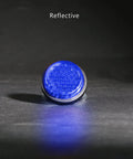 Deep Blue Reflector Motorcycle License Plate Bolts And Nuts Set for Bikes Cars Trailers Boats, single reflector close-up on dark surface