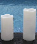 Waterproof Flameless LED Pillar Candles With Remote And Timer, Battery Operated Outdoor White Candles in pack of 2 by pool