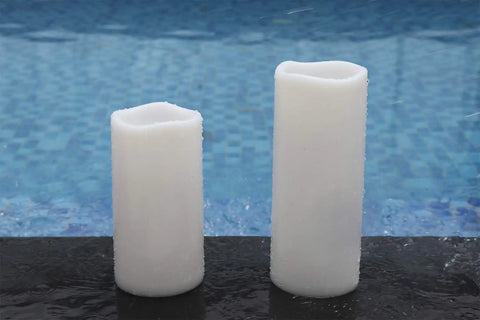 Waterproof Flameless LED Pillar Candles With Remote And Timer, Battery Operated Outdoor White Candles in pack of 2 by pool