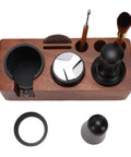 Portable Solid 58mm Stainless Steel Coffee Tamper Kit With Wooden Tamping Station, tools and brush arranged on wooden pad.