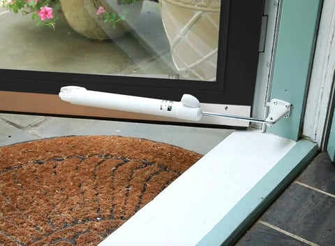 Hands-Free Hold Open Door Closer Kit For Medium And Lightweight Storm And Screen Doors, Tap Button Hold Open, Easy Release, Smooth Quiet Closing Motion, Black Finish, Durable Single Kit For Quick Install mounted on white doorframe