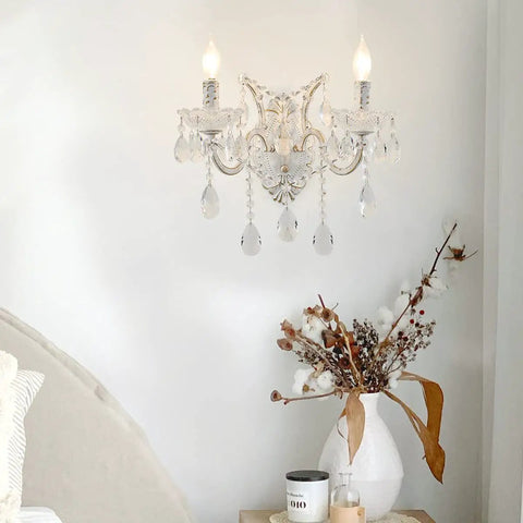White Crystal Wall Sconce Lighting with Modern K9 Glass Crystal Drops Shade, Sleek Wall Lamp in bedroom setting