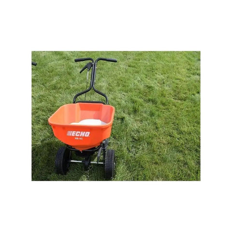 Front view of orange lawn spreader, not 60 Lb Heavy Duty Spreader Workhorse For Lawn And Garden Use With Durable Black Finish