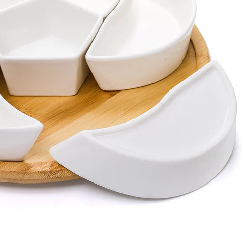 Close-up of Ceramic Rotating Serving Tray With Six Removable Compartments Lazy Susan Style showing ceramic bowls and bamboo base