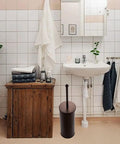Bathroom with Heavy Duty Bronze Toilet Plunger With Metal Canister Holder And Drip Cup beside a sink