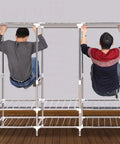 Two individuals demonstrating a Portable Wardrobe Closet 49 x 17 x 66 Inch, Waterproof Fabric Cover, Heavy Duty Steel Tube Frame.
