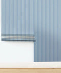 Blue Floral Stripe Wallpaper Featuring Silver Metallic Accents And Textured Fibrous Weave For Dope High End Vibes Easy Paste The Wall Method in room setting.