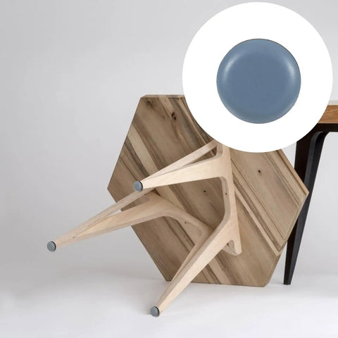 Heavy Duty Chair Glides And Furniture Sliders Set 16 Pieces for hardwood floors shown on a wooden hexagonal table leg