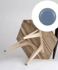 Wooden chair with blue PTFE and iron material floor protectors on legs. Sixteen Piece Furniture Pads For Chair Legs Floor Protectors.