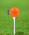 Soft Foam Golf Balls For Backyard Practice 41mm Realistic Feel and Long Lasting Durability on tee in grass background