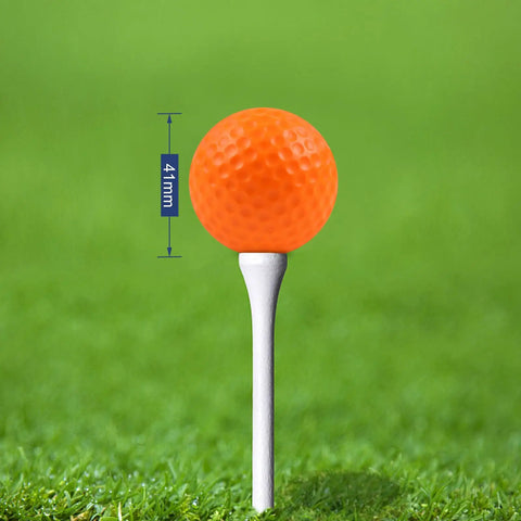 Soft Foam Golf Balls For Backyard Practice 41mm Realistic Feel and Long Lasting Durability on tee in grass background