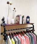 Wall Mounted Coat Hooks With Wooden Clothing Rail And Tight Black Metal Brackets For Entryway Organization Or Closet Storage Heavy Duty Frame Easy Install Clean Vibe Home Refresh with shirts and decorative items.