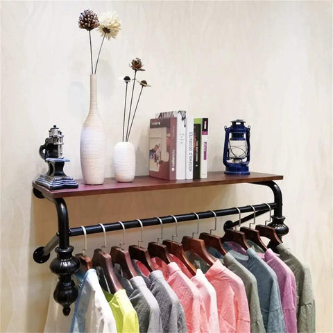 Wall Mounted Coat Hooks With Wooden Clothing Rail And Tight Black Metal Brackets For Entryway Organization Or Closet Storage Heavy Duty Frame Easy Install Clean Vibe Home Refresh with shirts and decorative items.