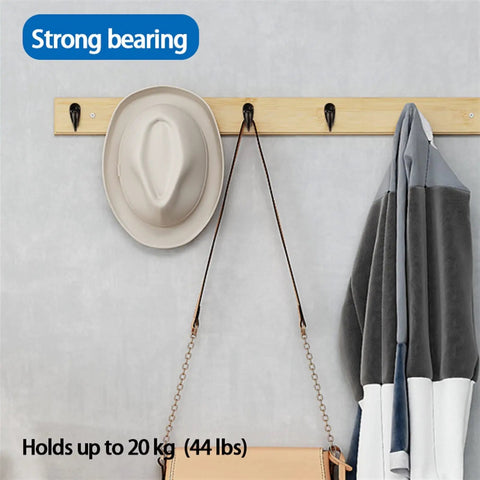 Stainless Steel Wall Hooks A Badass 10 Piece Set For Hanging Coats Robes And Heavy Duty Screw Mount Holder For Bedroom Kitchen Bathroom Decor Plus Super Slick Finish And Rock Solid Everyday Organization System, showing wall-mounted hooks holding a hat and a jacket.