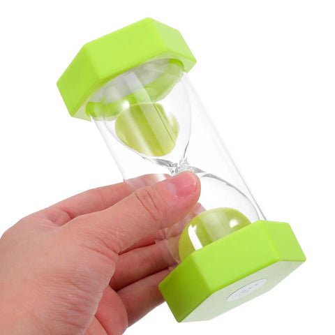 Hand holding 2 Minute Mini Hexagon Sand Timer In Grass Green, Ultra Handy Hourglass Timer For Toothbrushing, Cooking, Studying