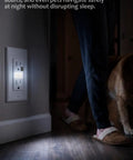 Wall Outlet With Night Light 10 Pack White, Frees Up Every Outlet With Built-In LED Night Lights in hallway with person walking