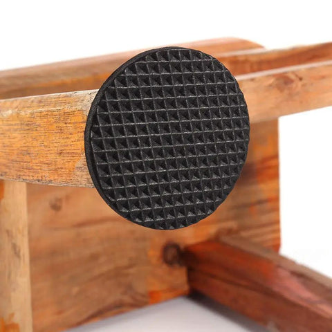 12 Pack Black Rubber Floor Pads With Adhesive Round Furniture Protectors for chairs, attached to wooden furniture to prevent scratches.