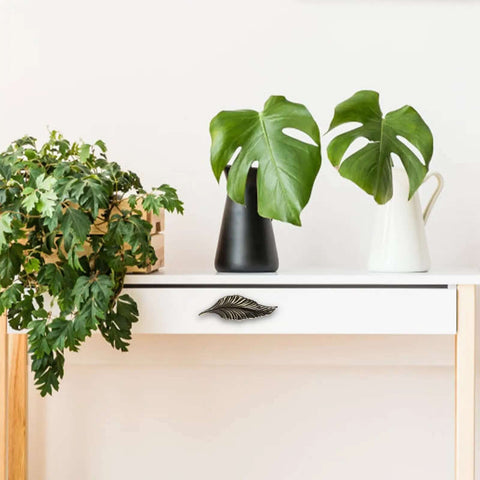 Antique Zinc Alloy Leaf Cabinet Handle Set on drawer with plants, Vintage Style Leaf Drawer Pulls, Retro Home Furniture Hardware
