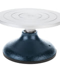 Front view of 7-inch sculpting wheel with white round turntable on blue metal base